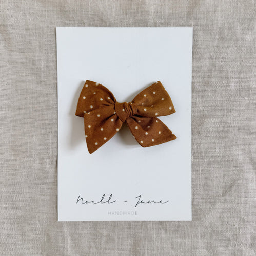 small pinwheel -  mustard dot