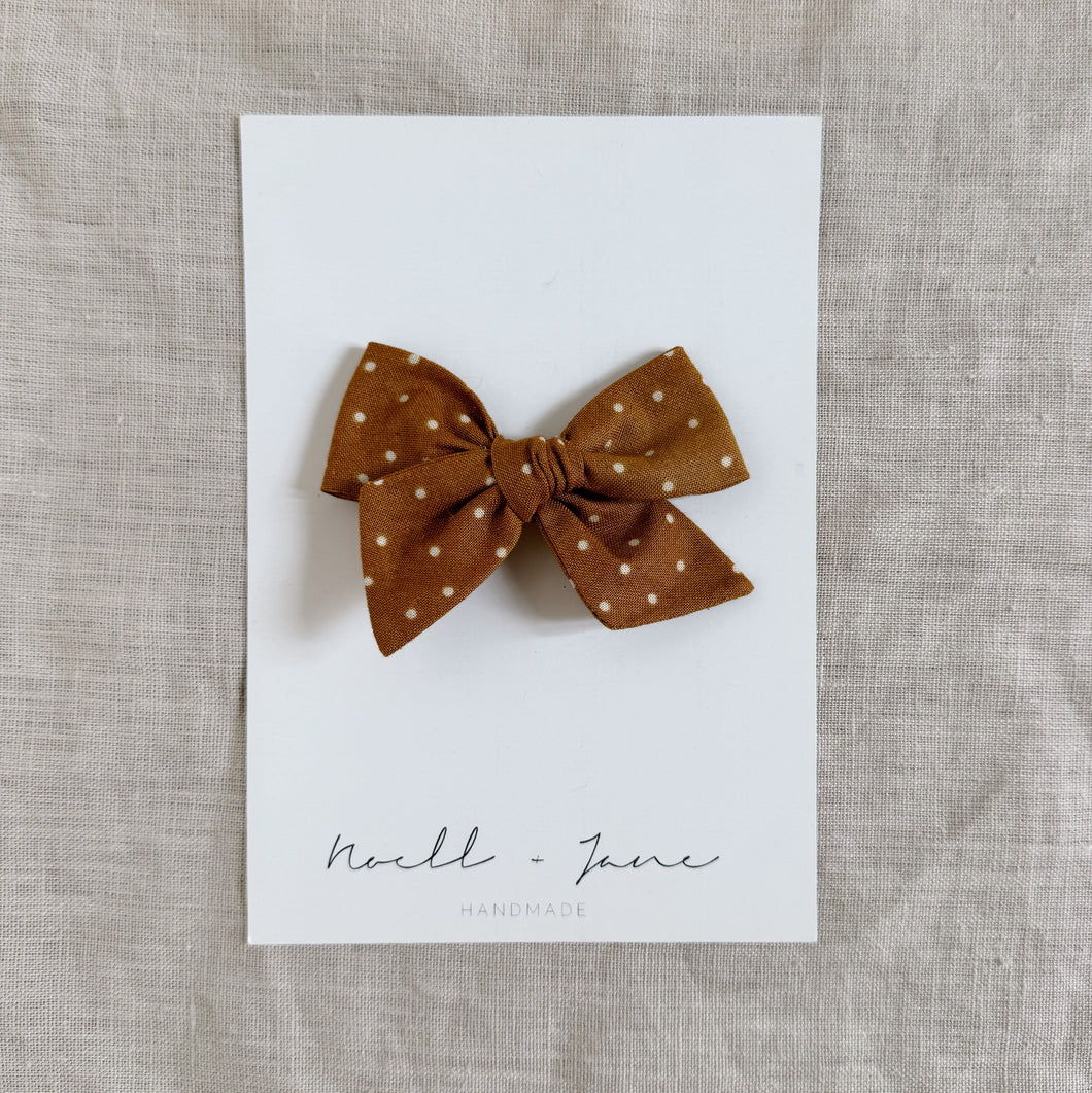 small pinwheel -  mustard dot