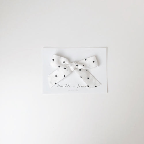 large schoolgirl - black dot