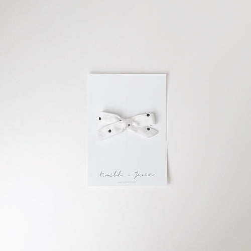 small schoolgirl - black dot