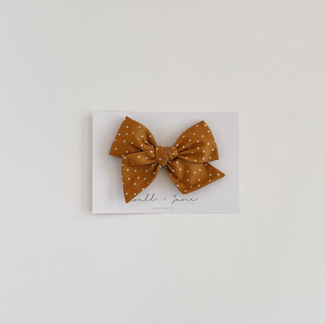 large pinwheel - mustard dot